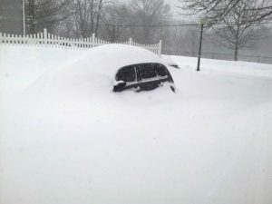 This car was almost completely covered after a blizzard in January 2015
