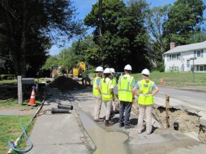 T&H engineers at a water main installation in Milford, MA