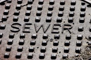 Manhole_cover_sewer_closeup-300x200