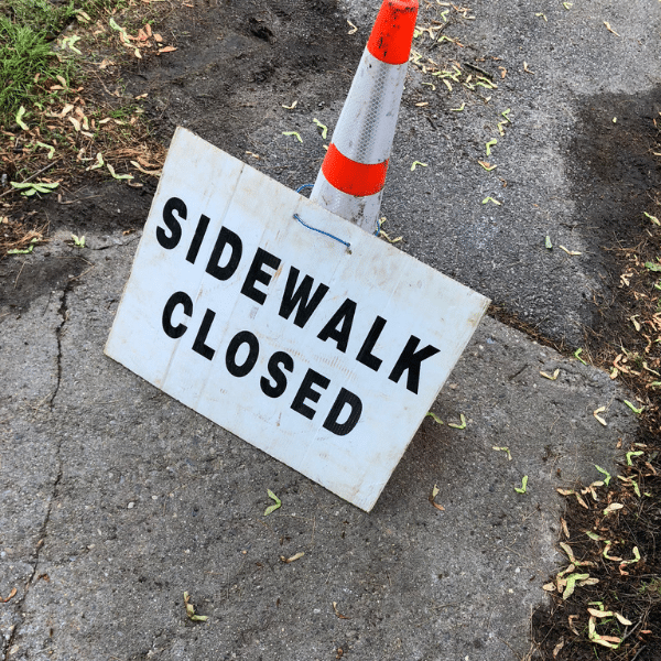 Lead service replacement program in Newton, MA. Sidewalk closed sign,